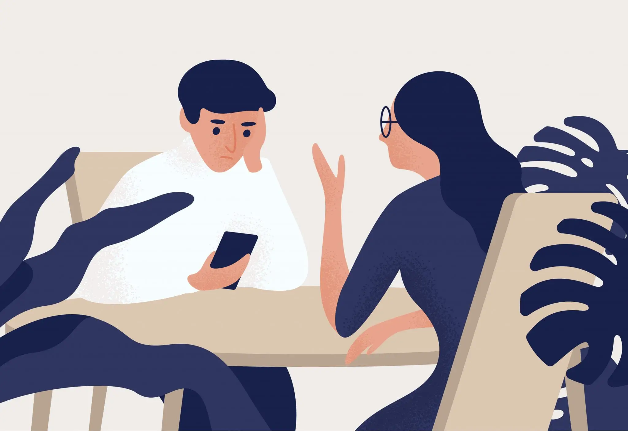 Couple Sitting at Table, Woman Talking to Her Partner, Man Looking at His Smartphone. Estrangement in Romantic Relationship, Emotional Distancing